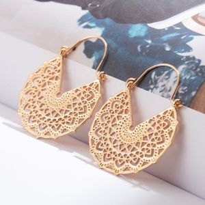 Brand New Hollow Semicircular Carved Earrings